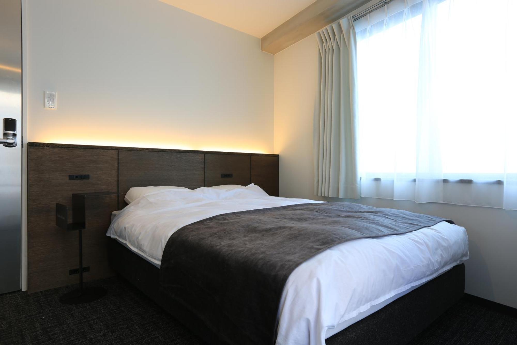 Albergue Unplan Shinjuku Tokio Habitación foto